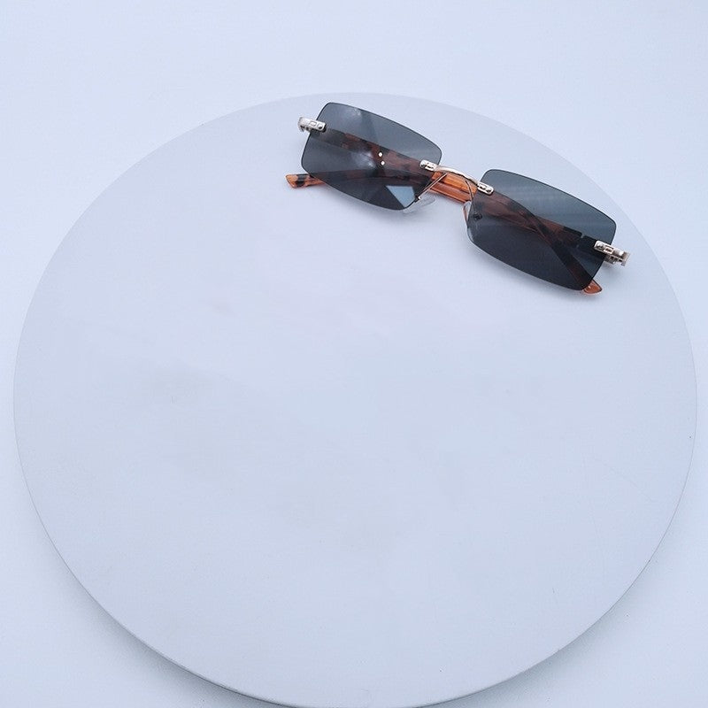 Women's fashionable rectangular sunglasses with unique design feature Bowlift