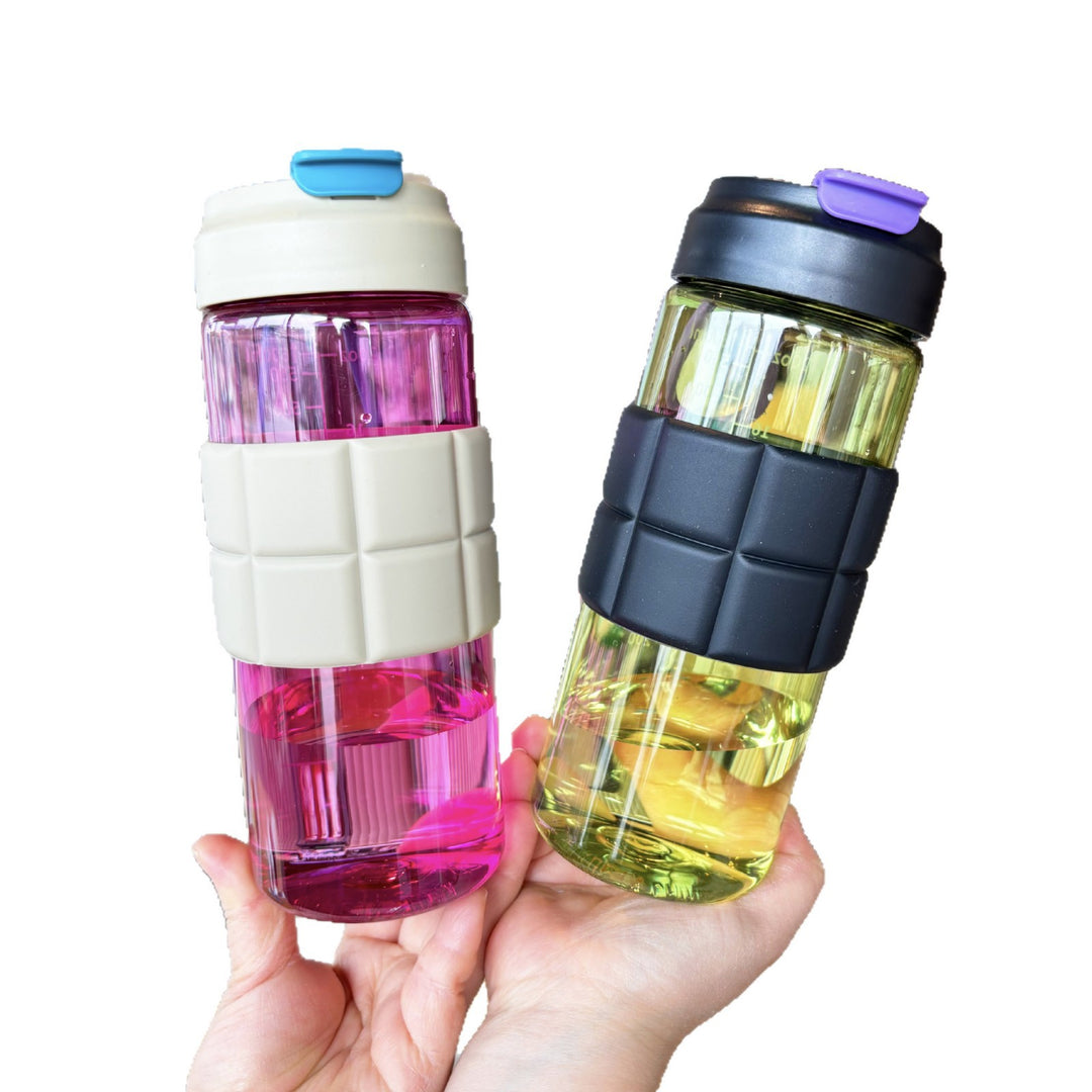 Women's transparent drinking bottle with non-slip silicone coating Bowlift