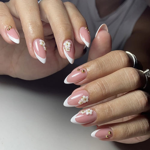 Artificial nail set with elegant floral accents and glitter Bowlift