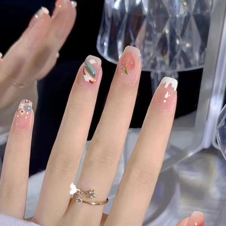 Creative nail art with fruit and flower motifs Bowlift