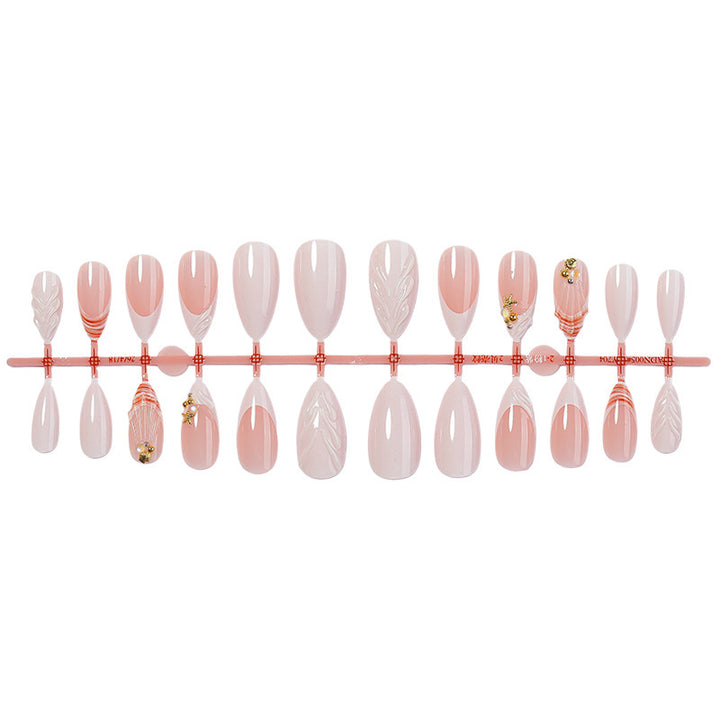 Acrylic nail set with elegant and floral decorations Bowlift