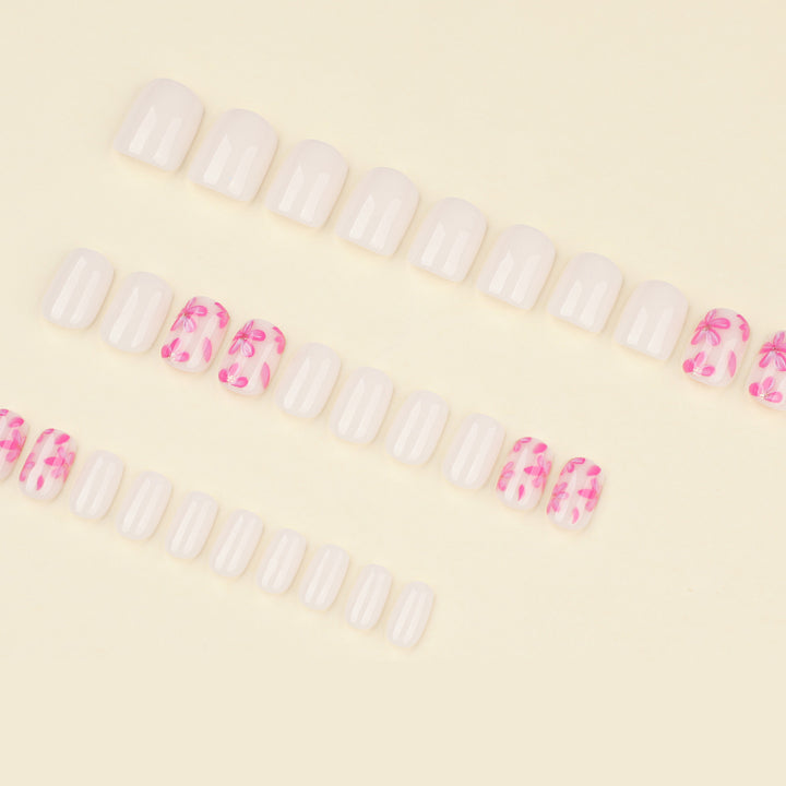 Stylish artificial nail design with floral accents Bowlift