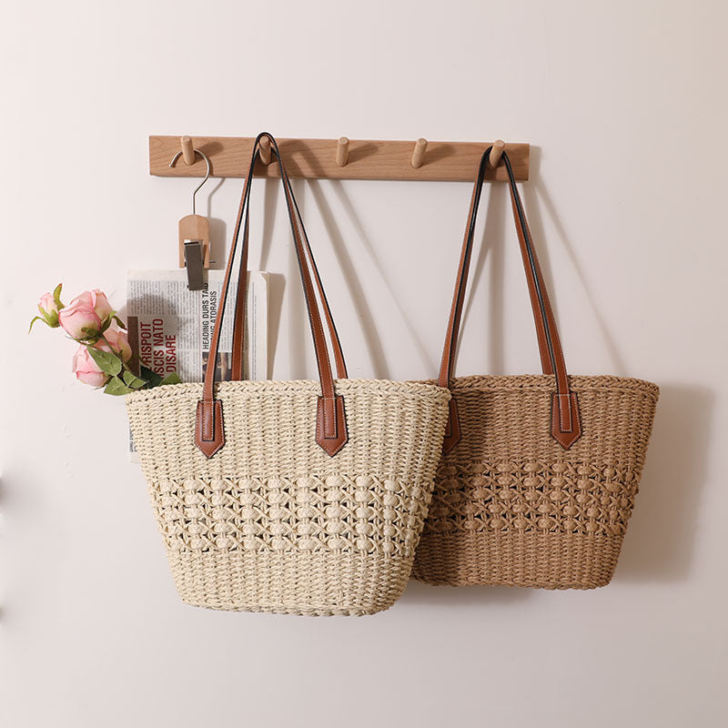 Handcrafted rattan basket bag with elegant leather accents Bowlift