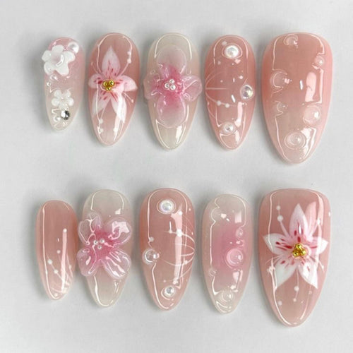 Artistic and creative nail extensions with floral accents Bowlift