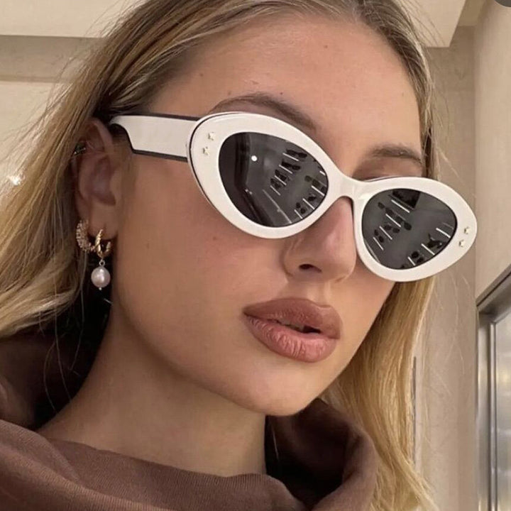 Ladies Cat-Eye Sunglasses with Luxurious Plastic Frame and Decorative Accents Bowlift
