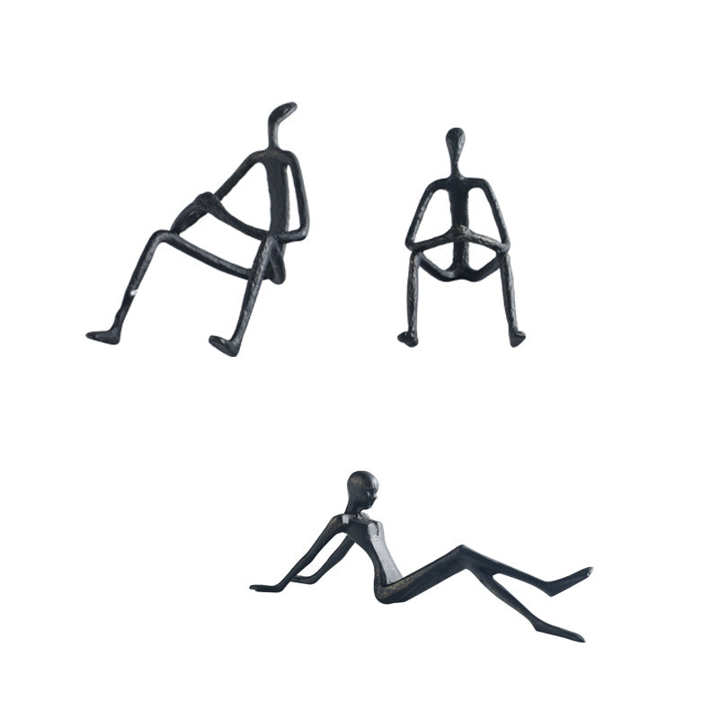 Artistic Sitting Figure Sculpture