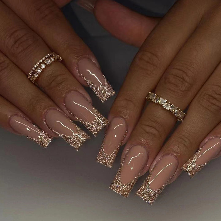 Artificial nail art with glitter and transparent design Bowlift