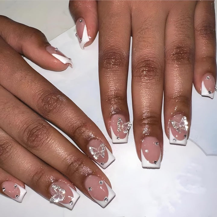 Artificial nails with elegant butterfly embellishments Bowlift