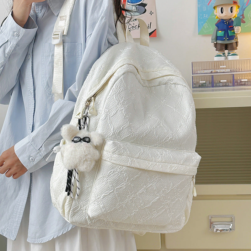 Backpack with Stylish Embossed Design and Multiple Compartments Bowlift