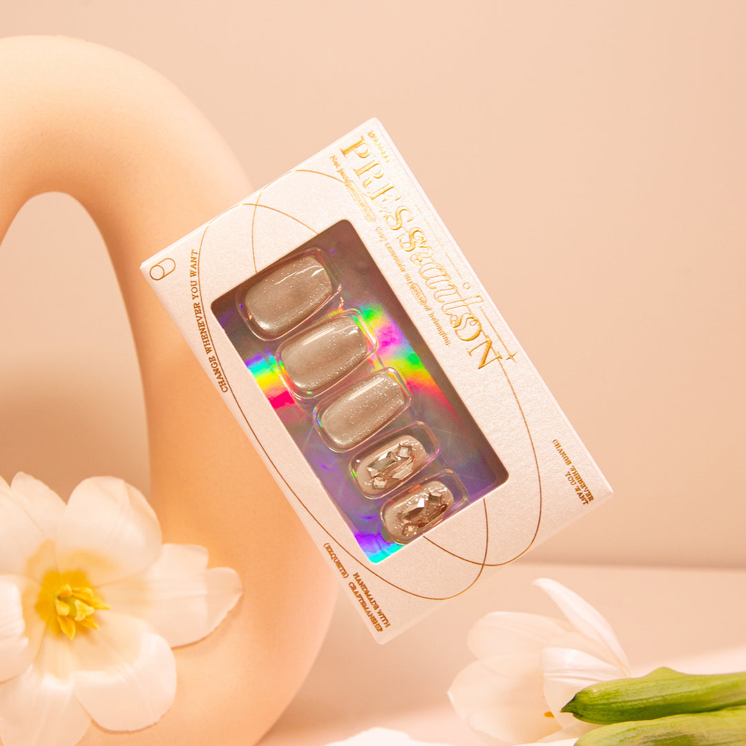 Elegant Nail Art with Glamorous Accents Bowlift