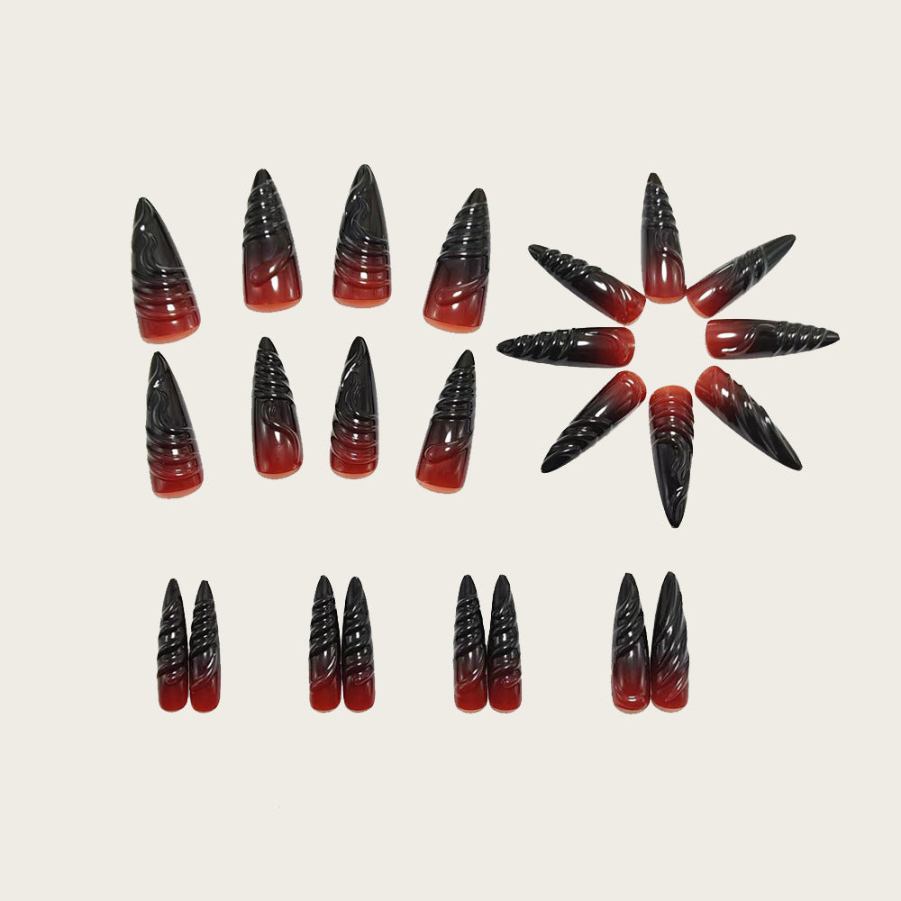 Gothic-style artificial nails with pointed tips and shiny surface Bowlift