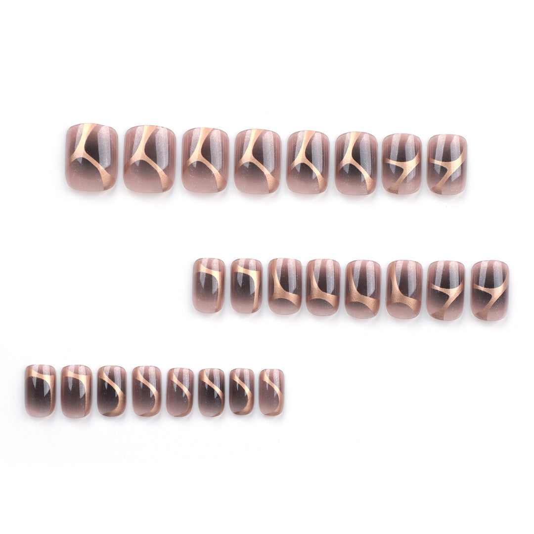 Artificial nail art with elegant metallic design and glitter accents Bowlift