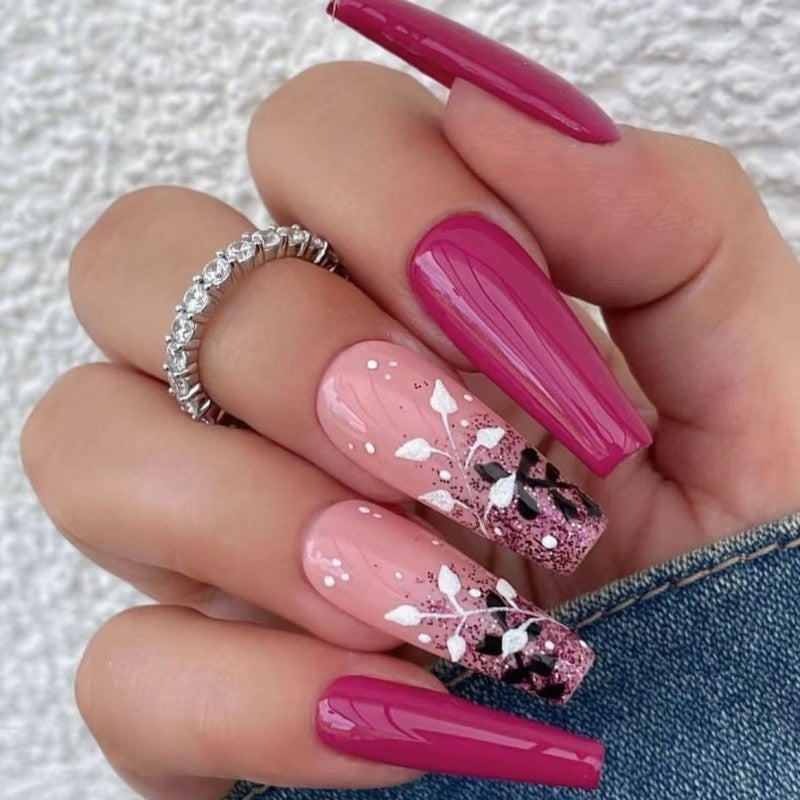 Artificial nails with floral and glittering accent Bowlift