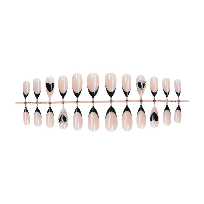 Artistic Press-On Nail Set with Heart and Gem Details Bowlift