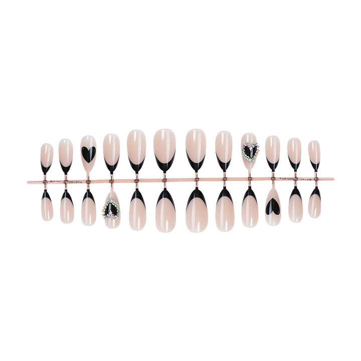 Artistic Press-On Nail Set with Heart and Gem Details Bowlift