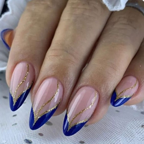 Artistic Nail Design with Elegant Golden Accents Bowlift