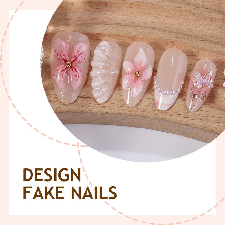 Creative nail art set with delicate flower and glitter embellishments Bowlift