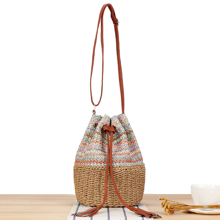 Shoulder bag made of hand-woven natural material with stylish leather accents Bowlift