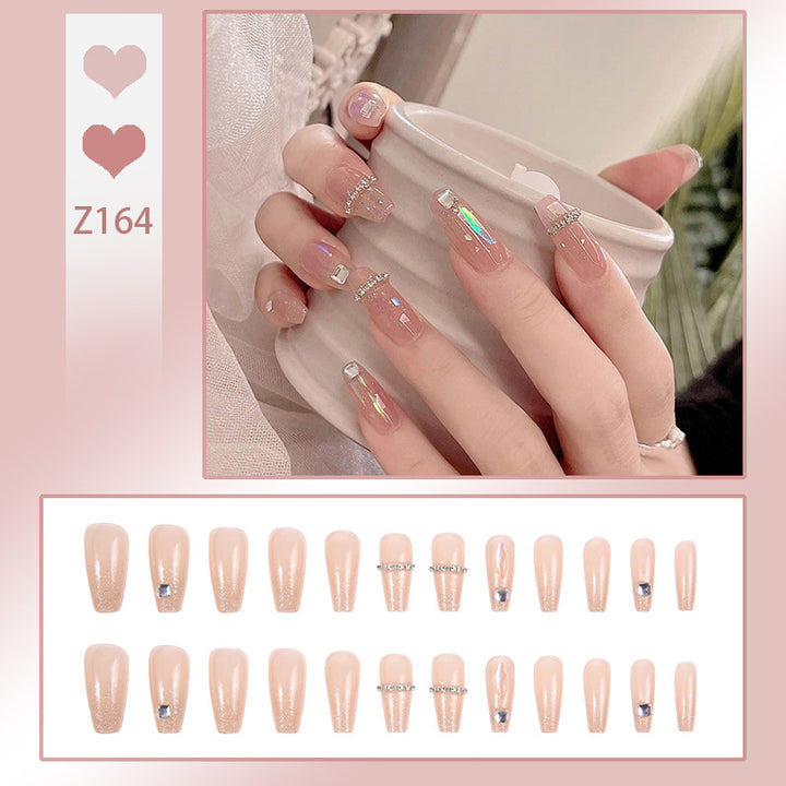 Acrylic nail set with glamorous rhinestone and glitter elements Bowlift