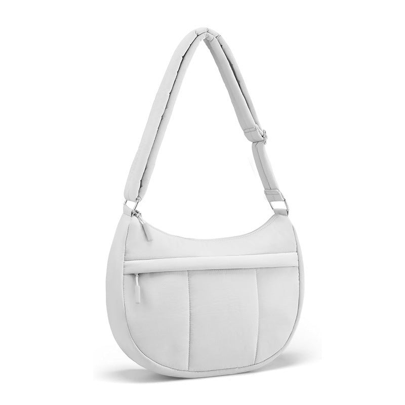 Stylish shoulder bag with padded carrying strap and versatile compartments Bowlift