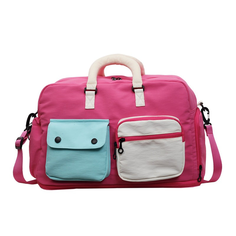 Sporty travel bag with multifunctional outer pockets Bowlift