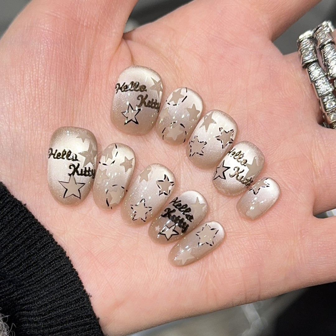 Artificial nail tips with Hello Kitty design Bowlift