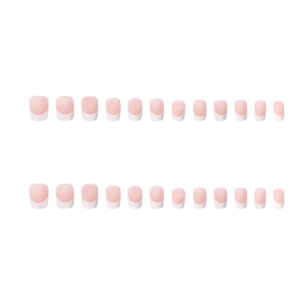 Artificial nails in elegant French style Bowlift