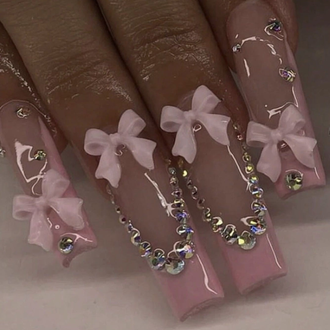 Nail art set with delicate arch decorations and rhinestone details Bowlift