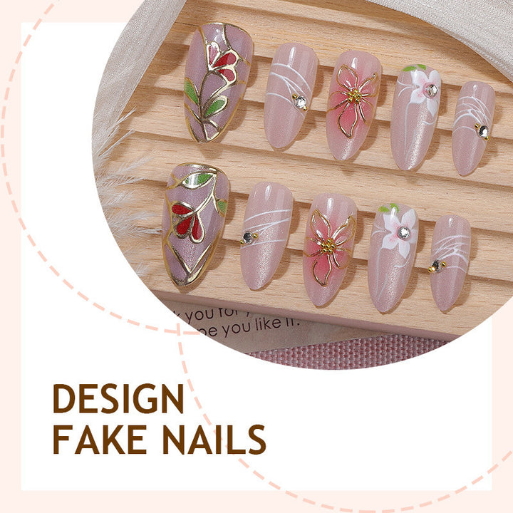 Artificial nail set with luxurious floral designs and glitter accents Bowlift