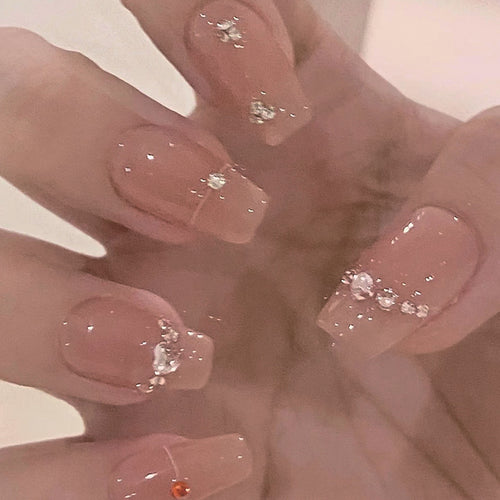 Glamorous nail art with rhinestone embellishment Bowlift