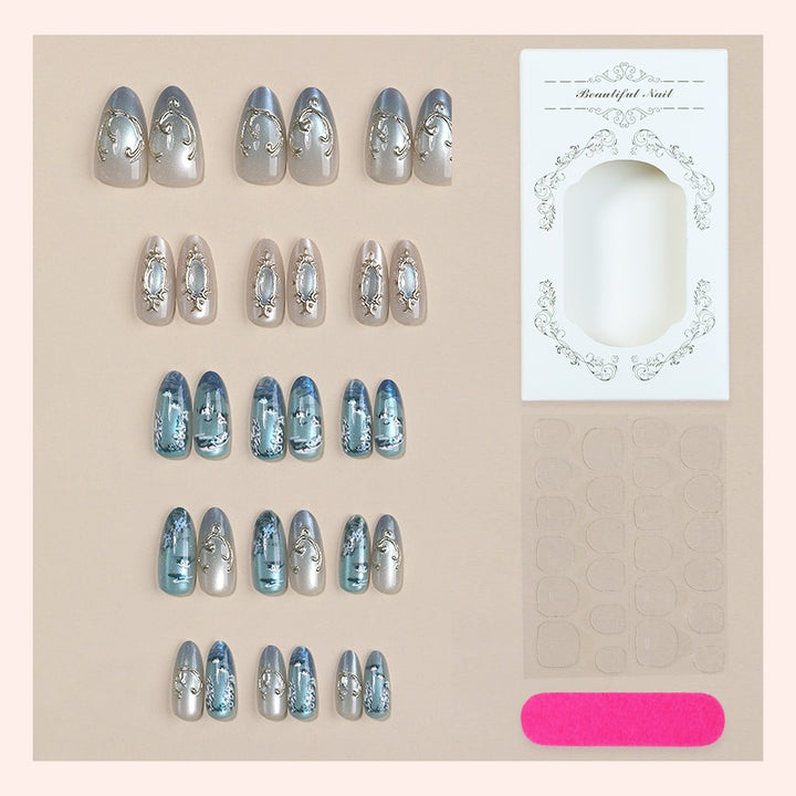Nail art set with luxurious patterns and elegant embellishments Bowlift