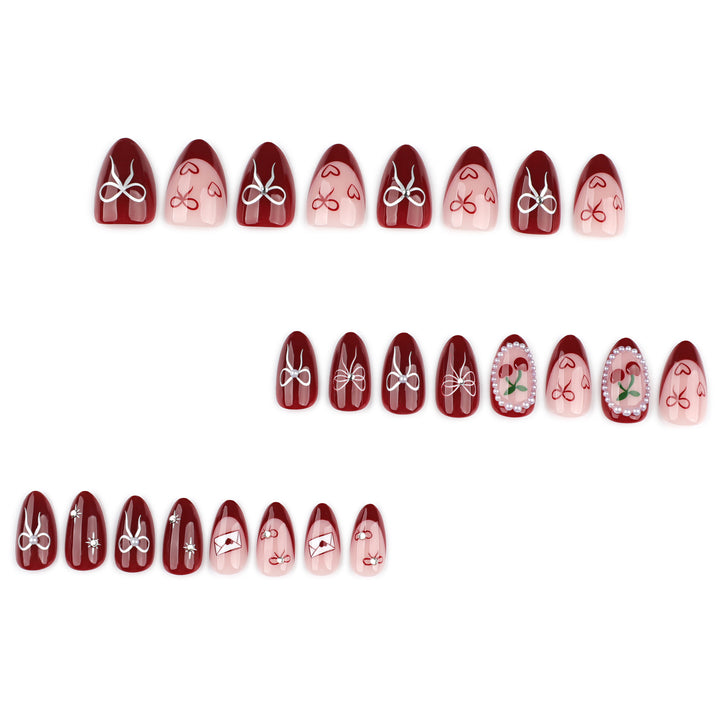 Artful nail designs with bow and rose motif Bowlift