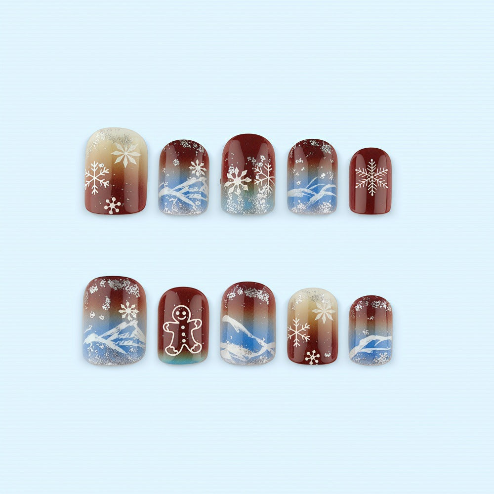 Artificial nails with festive snowflake and gingerbread motif Bowlift
