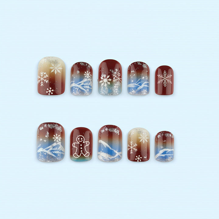 Artificial nails with festive snowflake and gingerbread motif Bowlift