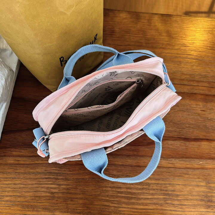 Tote bag with adjustable shoulder strap and extra storage Bowlift