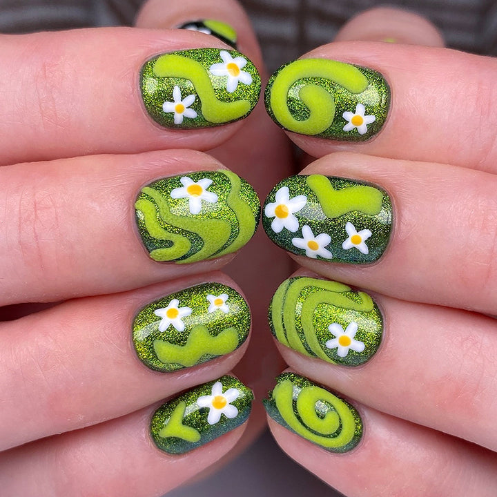 Artificial nails with floral and glittering accents Bowlift