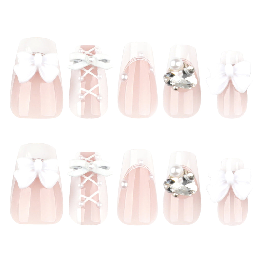 Artful Nail Art with Bows and Rhinestone Decorations Bowlift