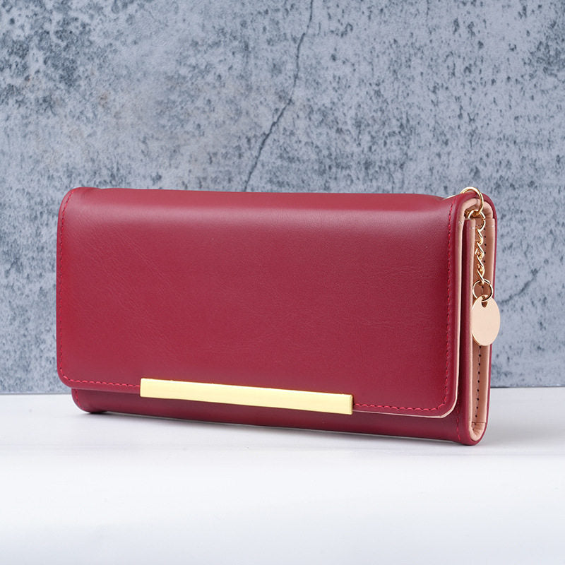 Premium vegan leather long wallet clutch with gold bar accent and detachable chain Bowlift