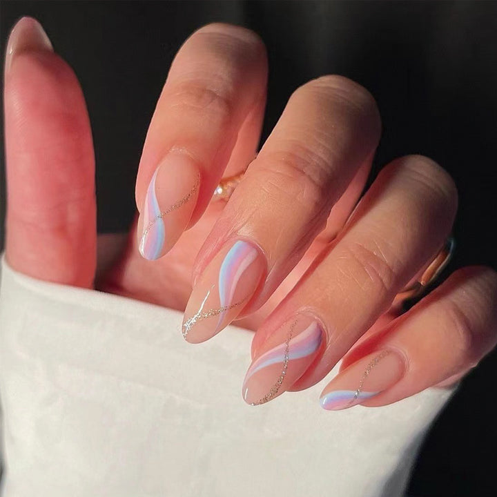 Artistic gel nails with modern gradients and rhinestone accents Bowlift