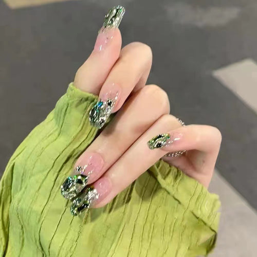 Glittering artificial nails in modern design Bowlift