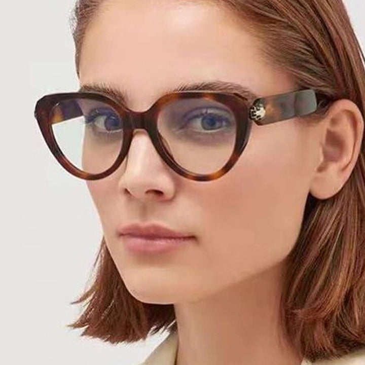 Ladies Cat-Eye Sunglasses with Golden Accents and Protective UV Filter Bowlift