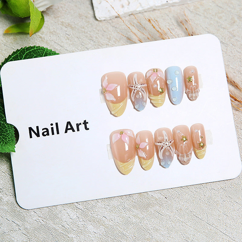 Artificial nails with floral motifs and glitter details Bowlift