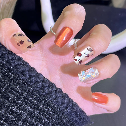 Artistic Press-On Nail Set with Stylish Animal Print Designs Bowlift