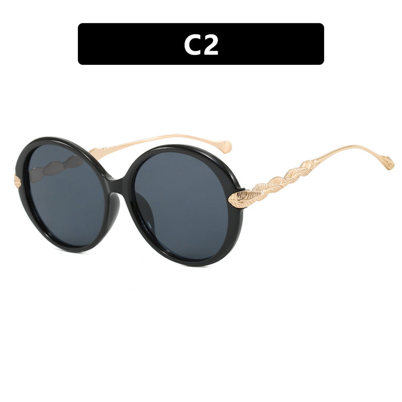 Ladies large round sunglasses with decorative metal accents Bowlift