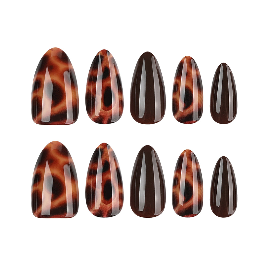 Artful stiletto nails with elegant leopard pattern Bowlift