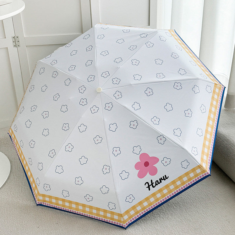 Ladies collapsible umbrella with playful floral pattern Bowlift