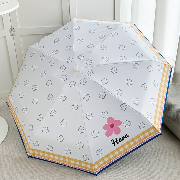 Ladies collapsible umbrella with playful floral pattern Bowlift