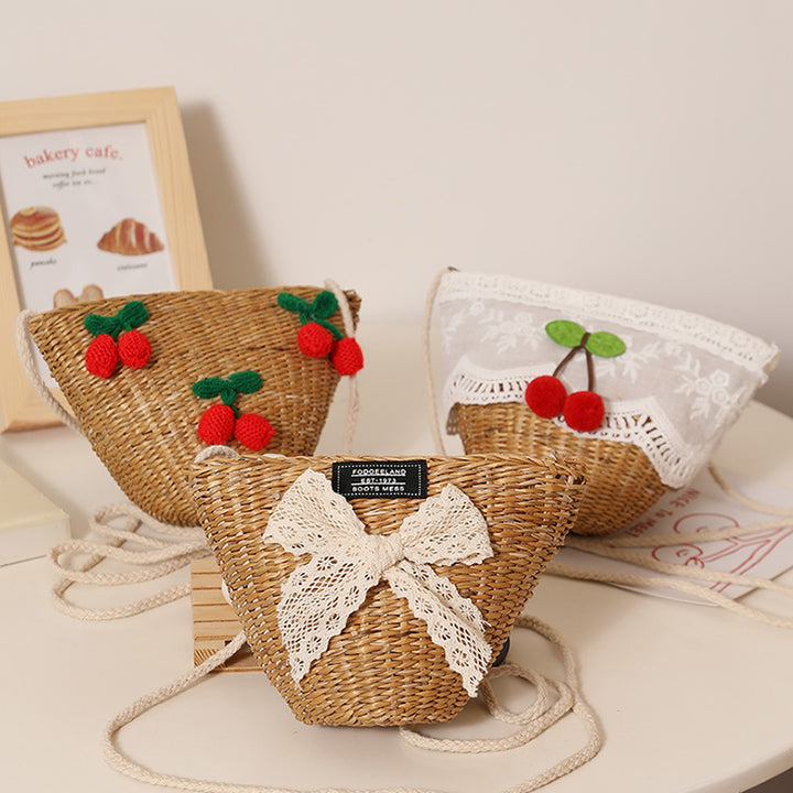 Playful straw shoulder bag with floral accents Bowlift