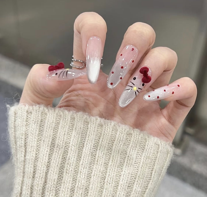 Artistic Press-On Nail Extensions with Floral Embellishments Bowlift