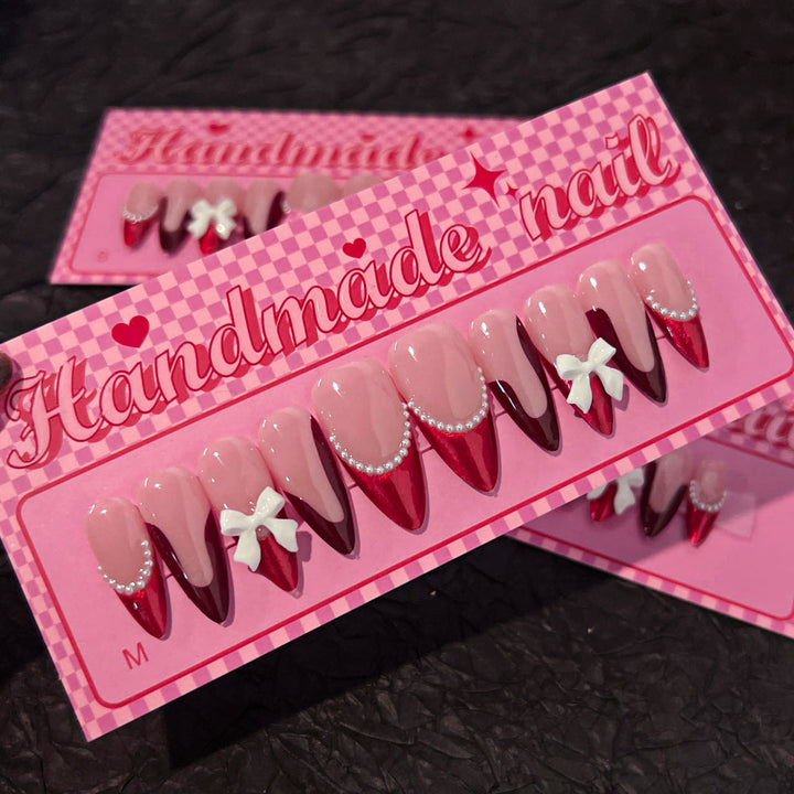 Artificial acrylic nails with detailed floral accents Bowlift